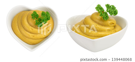 Mustard sauce in ceramic bowl isolated on white background. Top view. Flat lay Mustard sauce in ceramic bowl isolated on white background. Top view. Flat lay 139448068