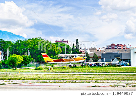 A single-engine ultralight aircraft waiting to take off at the airfield 139449087