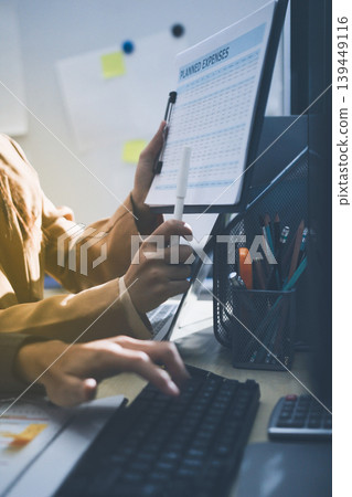 Accounting company provide finance and taxation planning for profitable cash flow, Auditor accountant working in office, analyze financial data and accounting record with calculator 139449116