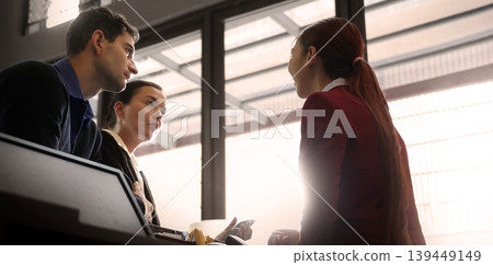 Deal Business. Business professionals discussing projects and digital information on tablet during corporate meeting. Team collaboration communication connect and client consultation in modern office Deal Business. Business professionals discussing projects and digital information on tablet during corporate meeting. Team collaboration communication connect and client consultation in modern office 139449149