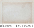 Old paper texture with stains, faded border, grain, blank center for stationery, archive, scrapbook, design. Natural background paper for mockup, copy space, banner, invitation, branding 139449201