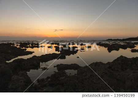 Yakushima, the island where gods reside: Dawn over the uplifted coral reef (winter) Yakushima, the island where gods reside: Dawn over the uplifted coral reef (winter) 139450199