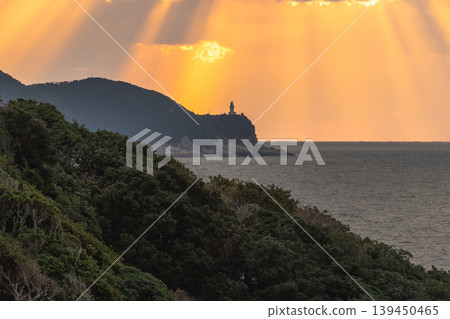 The sunset over Yakushima, where gods reside, with magnificent rays of light (winter) 139450465