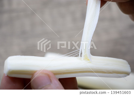 Ripping cheese Ripping cheese 139451603