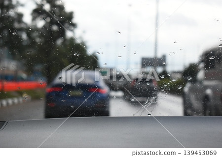 car on highway road with rainny season, blurred image car on highway road with rainny season, blurred image 139453069