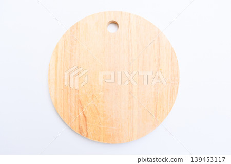 brown wooden sphere cuttingboard isolated on white background 139453117