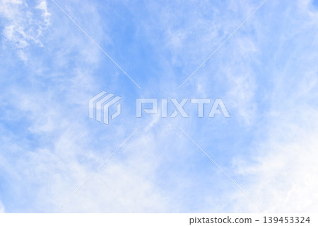 beautiful blue sky and white fluffy group of clouds with sunrise in the morning, natural background beautiful blue sky and white fluffy group of clouds with sunrise in the morning, natural background 139453324