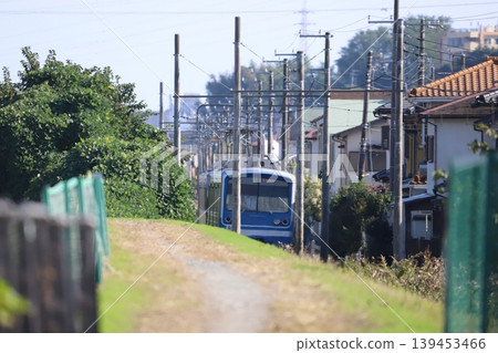 Trains on the Daiyuzan Line and residential area Trains on the Daiyuzan Line and residential area 139453466