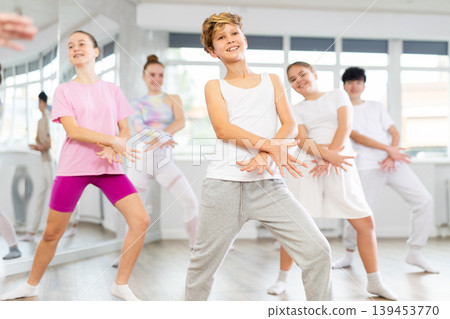 Group of children dancing jazz funk Group of children dancing jazz funk 139453770