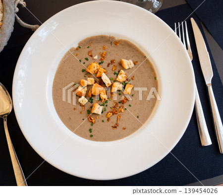Hot mushroom cream soup of champignons Hot mushroom cream soup of champignons 139454026