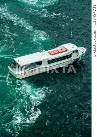 Naruto Bridge Promenade: Whirlpools (spring tide) and sightseeing boats from the Uzunomichi (Whirlpool Walkway) [Naruto City, Tokushima Prefecture] 139454731