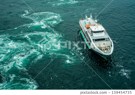 Naruto Bridge Promenade: Whirlpools (spring tide) and sightseeing boats from the Uzunomichi (Whirlpool Walkway) [Naruto City, Tokushima Prefecture] 139454735
