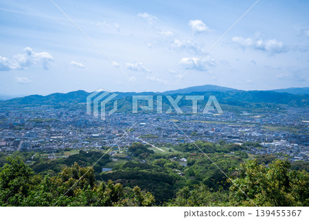 View of Dazaifu city in Fukuoka Prefecture from the ruins of Iwaya Castle. View of Dazaifu city in Fukuoka Prefecture from the ruins of Iwaya Castle. 139455367