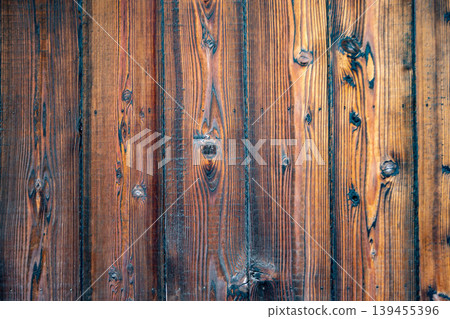 Burnt cedar wood wall texture and wood grain details Burnt cedar wood wall texture and wood grain details 139455396