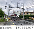 Kintetsu train near the level crossing 139455807