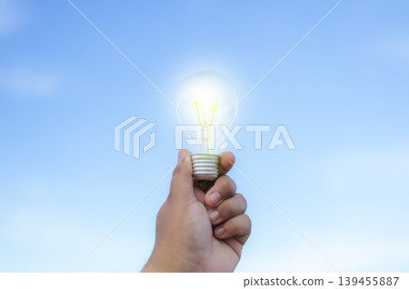 Renewable energy concept Earth Day or environment protection Hands protect forests that grow on the ground and help save the world. Renewable energy concept Earth Day or environment protection Hands protect forests that grow on the ground and help save the world. 139455887