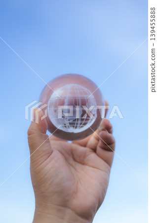 Renewable energy concept Earth Day or environment protection Hands protect forests that grow on the ground and help save the world. Renewable energy concept Earth Day or environment protection Hands protect forests that grow on the ground and help save the world. 139455888