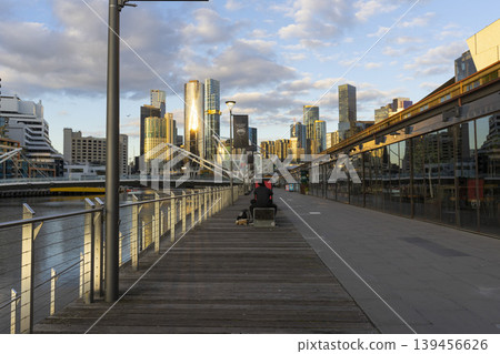 Melbourne, Australia - July 7, 2024 : Landscape of the South Wharf with the blue sky in Melbourne, Australia on July 7, 2024. Melbourne, Australia - July 7, 2024 : Landscape of the South Wharf with the blue sky in Melbourne, Australia on July 7, 2024. 139456626