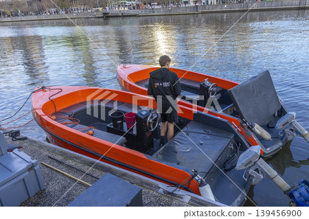 Melbourne, Australia - July 7, 2024 : ON A BOAT is a Self-drive tourist boats on the Yarra River in South Melbourne, Australia on July 7, 2024. Melbourne, Australia - July 7, 2024 : ON A BOAT is a Self-drive tourist boats on the Yarra River in South Melbourne, Australia on July 7, 2024. 139456900