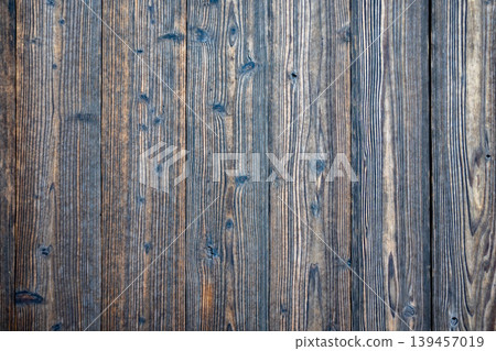 The texture of a wooden wall that has changed over time The texture of a wooden wall that has changed over time 139457019