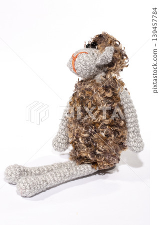 Crocheted sheep toy on a white background Crocheted sheep toy on a white background 139457784