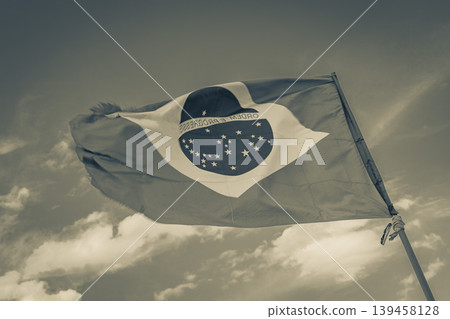 Brazilian flag with blue sky background Rio de Janeiro Brazil. Brazilian flag with blue sky background Rio de Janeiro Brazil. 139458128