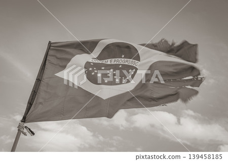 Brazilian flag with blue sky background Rio de Janeiro Brazil. 139458185