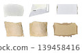 Brown and white kraft paper torn into pieces isolated on white background 139458416