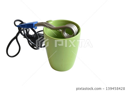 Immersion electric kettle and ceramic mug. Immersion electric kettle and ceramic mug. 139458428
