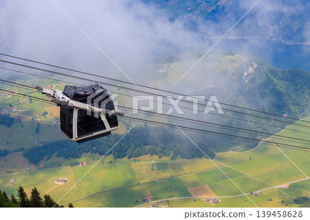 Gondola of Stanserhorn cabrio cable car to Stanserhorn mountain in Switzerland Gondola of Stanserhorn cabrio cable car to Stanserhorn mountain in Switzerland 139458628