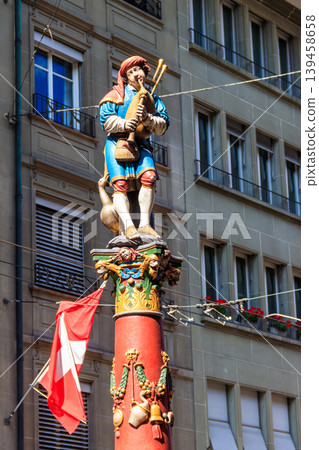 Piper Fountain (Pfeiferbrunnen) in the old city of Bern, Switzerland. The fountain was built in 1545-1546. Author Hans Ging Piper Fountain (Pfeiferbrunnen) in the old city of Bern, Switzerland. The fountain was built in 1545-1546. Author Hans Ging 139458658