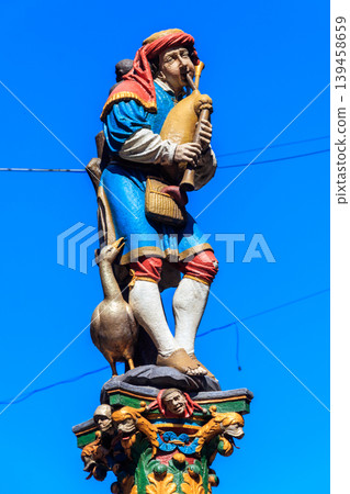 Piper Fountain (Pfeiferbrunnen) in the old city of Bern, Switzerland. The fountain was built in 1545-1546. Author Hans Ging Piper Fountain (Pfeiferbrunnen) in the old city of Bern, Switzerland. The fountain was built in 1545-1546. Author Hans Ging 139458659