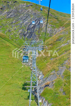 Overhead cable car to First mountain, Grindelwald, Switzerland Overhead cable car to First mountain, Grindelwald, Switzerland 139458684