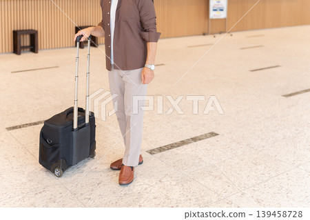 Senior male travelers staying at a hotel Senior male travelers staying at a hotel 139458728