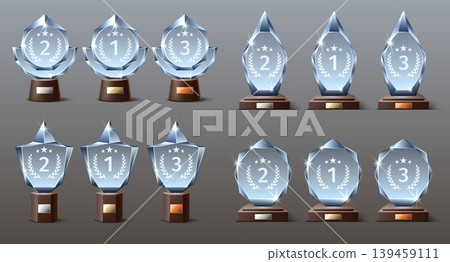 Realistic crystal trophies. Glass awards. Nominee win numbers. Gold, silver or bronze rewards. Competition leadership. Shiny 3D shapes. Winner triumph. Vector isolated champion prizes set Realistic crystal trophies. Glass awards. Nominee win numbers. Gold, silver or bronze rewards. Competition leadership. Shiny 3D shapes. Winner triumph. Vector isolated champion prizes set 139459111