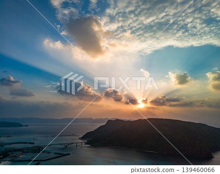 Drone footage of the sunrise viewed from Amagi Observatory on Aka Island. Aka Island, Kerama Islands, Shimajiri District, Okinawa Prefecture, 2025 Drone footage of the sunrise viewed from Amagi Observatory on Aka Island. Aka Island, Kerama Islands, Shimajiri District, Okinawa Prefecture, 2025 139460066