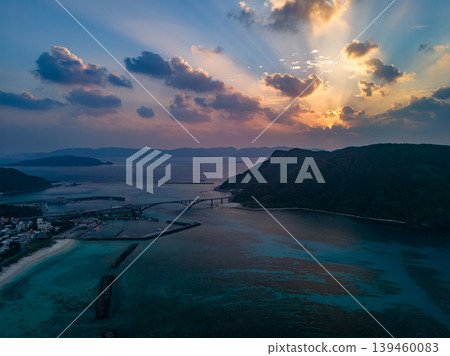Drone footage of the sunrise viewed from Amagi Observatory on Aka Island. Aka Island, Kerama Islands, Shimajiri District, Okinawa Prefecture, 2025 Drone footage of the sunrise viewed from Amagi Observatory on Aka Island. Aka Island, Kerama Islands, Shimajiri District, Okinawa Prefecture, 2025 139460083