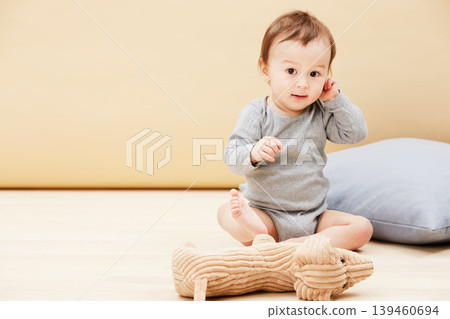Baby, portrait and stuffed animal or playing in home or comfort, childhood development or entertainment. Kid, toy teddy and learning in apartment or education progress, coordination, growth or mockup Baby, portrait and stuffed animal or playing in home or comfort, childhood development or entertainment. Kid, toy teddy and learning in apartment or education progress, coordination, growth or mockup 139460694