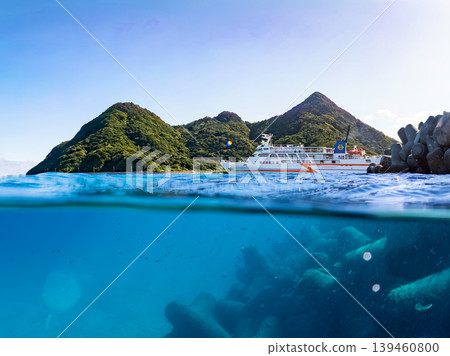 A half-submerged photo of Aka Beach on Aka Island. A ferry is passing in the distance. Aka Beach (Majyahama), Kerama Islands, Shimajiri District, Okinawa Prefecture A half-submerged photo of Aka Beach on Aka Island. A ferry is passing in the distance. Aka Beach (Majyahama), Kerama Islands, Shimajiri District, Okinawa Prefecture 139460800