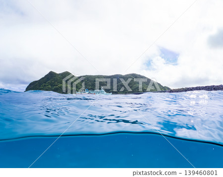 A half-submerged photo of Aka Beach on Aka Island. A ferry is passing in the distance. Aka Beach (Majyahama), Kerama Islands, Shimajiri District, Okinawa Prefecture A half-submerged photo of Aka Beach on Aka Island. A ferry is passing in the distance. Aka Beach (Majyahama), Kerama Islands, Shimajiri District, Okinawa Prefecture 139460801