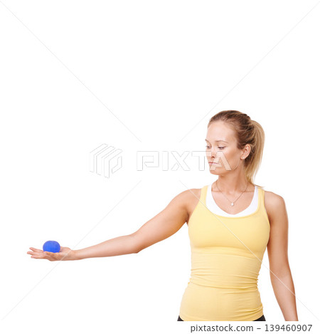 Stress ball, health and woman in studio for mindful, fitness and arm exercise with focus. Squeeze, sport equipment and young female person from Canada with anxiety relief isolated by white background Stress ball, health and woman in studio for mindful, fitness and arm exercise with focus. Squeeze, sport equipment and young female person from Canada with anxiety relief isolated by white background 139460907