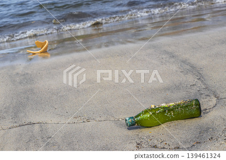 Plastic bottle stranded washed up garbage pollution on beach Brazil. Plastic bottle stranded washed up garbage pollution on beach Brazil. 139461324