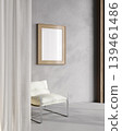 Minimal poster mockup in modern interior with wooden frame, armchair and concrete wall 139461486