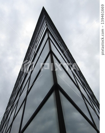 The glass-enclosed Chiba Port Tower stands amidst the cloudy skies of Chiba Prefecture. The glass-enclosed Chiba Port Tower stands amidst the cloudy skies of Chiba Prefecture. 139461669