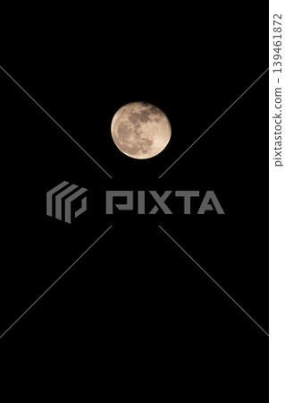 Close-up of the moon floating in the early spring night sky 37 Close-up of the moon floating in the early spring night sky 37 139461872