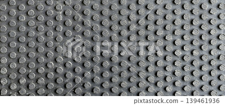 Rubber flooring with coin texture. 139461936