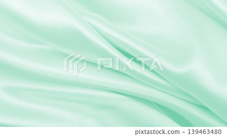 Smooth elegant green silk or satin luxury cloth texture as abstract background. Luxurious background design Smooth elegant green silk or satin luxury cloth texture as abstract background. Luxurious background design 139463480