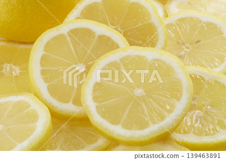 Fresh lemons placed against a white background Fresh lemons placed against a white background 139463891