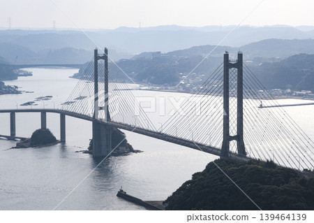 The Yobuko Bridge as seen from Kabeshima's Wind-Viewing Hill Park. The Yobuko Bridge as seen from Kabeshima's Wind-Viewing Hill Park. 139464139