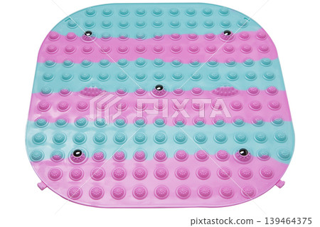 Colorful striped acupressure foot mat with integrated therapy magnets isolated. Colorful striped acupressure foot mat with integrated therapy magnets isolated. 139464375
